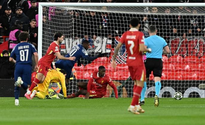 Liverpool, England, 11th March 2025. Ousmane Dembele of Paris St Germain scoring his sides opening goal during the UEFA Champions League match Liverpool vs Paris Saint Germain at Anfield, Liverpool. Picture credit should read: Cody Froggatt Sportimage EDITORIAL USE ONLY. No use with unauthorised audio, video, data, fixture lists, club league logos or live services. Online in-match use limited to 120 images, no video emulation. No use in betting, games or single club league player publications. SPI_CF_034_Man_City_Real_Madrid SPI-3739-0034