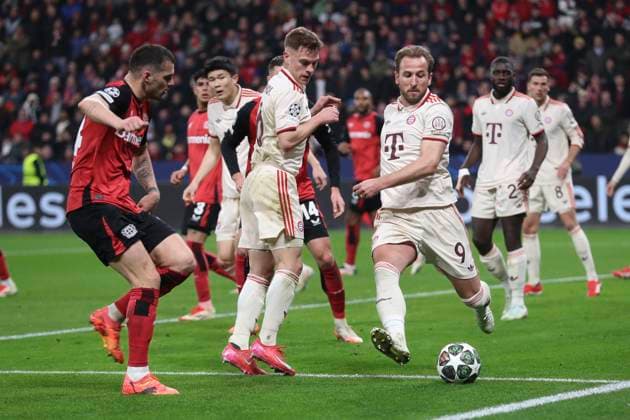 Granit Xhaka (Bayer 04 Leverkusen), Joshua Kimmich (FC Bayern München) und Harry Kane (FC Bayern München) battle for the ball during the UEFA Champions League 2024 25 Round of 16 Second Leg match between Bayer 04 Leverkusen and FC Bayern München at BayArena on March 11, 2025 in Leverkusen, Germany. (Photo by Oliver Kaelke DeFodi Images)