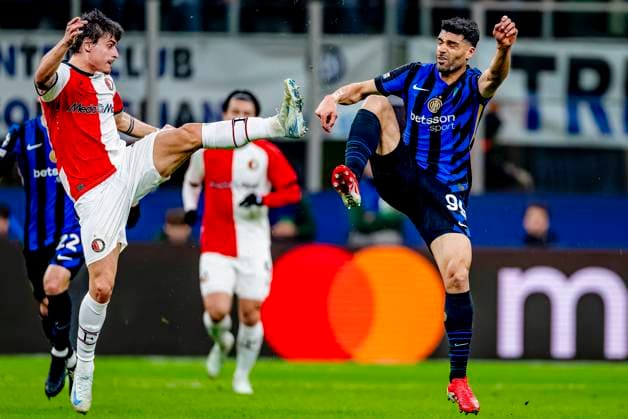 Feyenoord Rotterdam defender Hugo Bueno, FC Internazionale Milan forwarder Mehdi Taremi during the match Inter - Feyenoord at the San Siro Stadium for the UEFA Champions League - Round of 16 - 2st leg season 2024-2025 in MILAN, Italia on 11 march 2025, (photo by Marcel van Dorst EYE4images DeFodi Images)