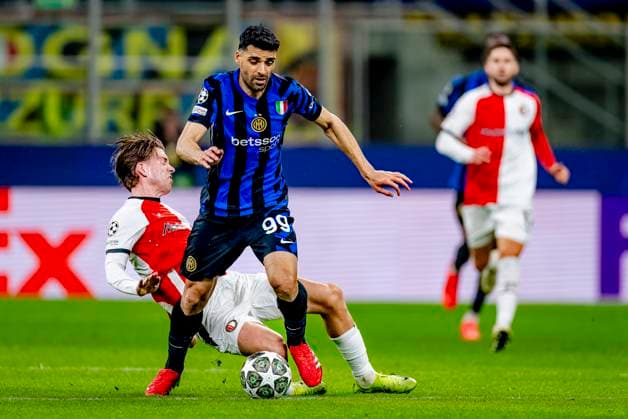 Feyenoord Rotterdam defender Gijs Smal, FC Internazionale Milan forwarder Mehdi Taremi during the match Inter - Feyenoord at the San Siro Stadium for the UEFA Champions League - Round of 16 - 2st leg season 2024-2025 in MILAN, Italia on 11 march 2025, (photo by Marcel van Dorst EYE4images DeFodi Images)