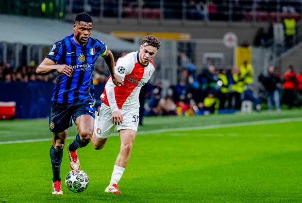 FC Internazionale Milan defender Denzel Dumfries, Feyenoord Rotterdam forwarder Aymen Sliti during the match Inter - Feyenoord at the San Siro Stadium for the UEFA Champions League - Round of 16 - 2st leg season 2024-2025 in MILAN, Italia on 11 march 2025, (photo by Marcel van Dorst EYE4images DeFodi Images)
