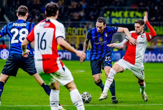 FC Internazionale Milan defender Hakan Calhanoglu, Feyenoord Rotterdam forwarder Luka Ivanusec during the match Inter - Feyenoord at the San Siro Stadium for the UEFA Champions League - Round of 16 - 2st leg season 2024-2025 in MILAN, Italia on 11 march 2025, (photo by Marcel van Dorst EYE4images DeFodi Images)