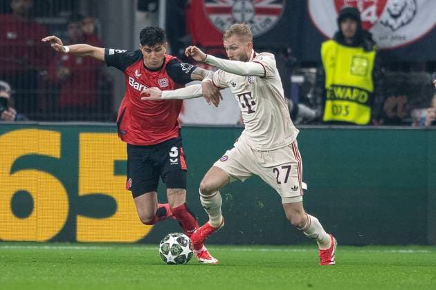 11.03.2025, Fussball: UEFA Champions League, Saison 2024 2025, Achtelfinale, Rueckspiel, Bayer 04 Leverkusen - FC Bayern Muenchen in der BayArena in Leverkusen. ze Piero Hincapie (Bayer 04 Leverkusen, 03)3 und Konrad Laimer (FC Bayern Muenchen, 27). Foto: Kirchner-Media Thomas Haesler Copyright: xKirchner-Media ThomasxHaeslerx