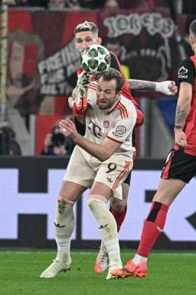 11.03.2025, xsltx, Fussball UEFA Champions League, Bayer 04 Leverkusen - Bayern München v.l. Robert Andrich (Leverkusen, 8), Harry Kane (Muenchen, 9) Zweikampf, Duell, Kampf, tackle (DFL DFB REGULATIONS PROHIBIT ANY USE OF PHOTOGRAPHS as IMAGE SEQUENCES and or QUASI-VIDEO) Leverkusen