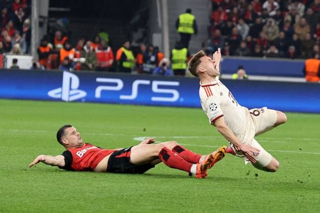 Patrik Schick (Bayer 04 Leverkusen) und Joshua Kimmich (FC Bayern München) beim Achtelfinal-Rückspiel der UEFA Champions League (Saison 2024 25) Bayer Leverkusen - FC Bayern München Copyright: Thomas Pakusch