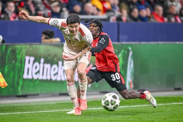 Leverkusen, Germany, 11.03.2025: Minjae Kim (FC Bayern Muenchen) und Jeremie Frimpong (Bayer 04 Leverkusen) battle for the ball during the UEFA Champions League 2024 25 Round of 16 Second Leg match between Bayer 04 Leverkusen and FC Bayern München at BayArena on March 11, 2025 in Leverkusen, Germany. (Photo by Harry Langer DeFodi Images)