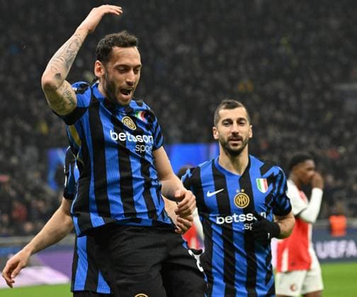 March 11, 2025, Milan: Inter Milan™s midfielder Hakan Ã‡alhano?lu (L) celebrates after scoring during the UEFA Champions League Round of 16 second leg soccer match between Inter Milan and Feyenoord at the Giuseppe Meazza Stadium in Milan, Italy, 11 March 2025. ANSA DANIEL DAL ZENNARO Champions: Inter-Feyenoord  - ZUMAa110 20250311_zaf_a110_029 Copyright: xDanielxDalxZennarox