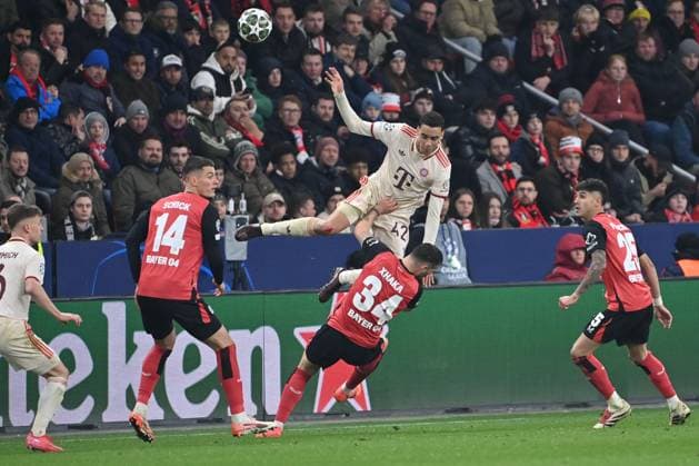 11.03.2025, xjrdrx, Fussball UEFA Champions League, Bayer 04 Leverkusen - Bayern München v.l. Jamal Musiala (Muenchen, 42), Granit Xhaka (Leverkusen, 34) Zweikampf, Duell, Kampf, tackle (DFL DFB REGULATIONS PROHIBIT ANY USE OF PHOTOGRAPHS as IMAGE SEQUENCES and or QUASI-VIDEO) Leverkusen