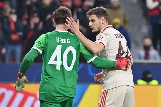 11.03.2025, xjrdrx, Fussball UEFA Champions League, Bayer 04 Leverkusen - Bayern München v.l. Jonas Urbig (Muenchen, 40), Josip Stanisic (Muenchen, 44) jubeln (DFL DFB REGULATIONS PROHIBIT ANY USE OF PHOTOGRAPHS as IMAGE SEQUENCES and or QUASI-VIDEO) Leverkusen