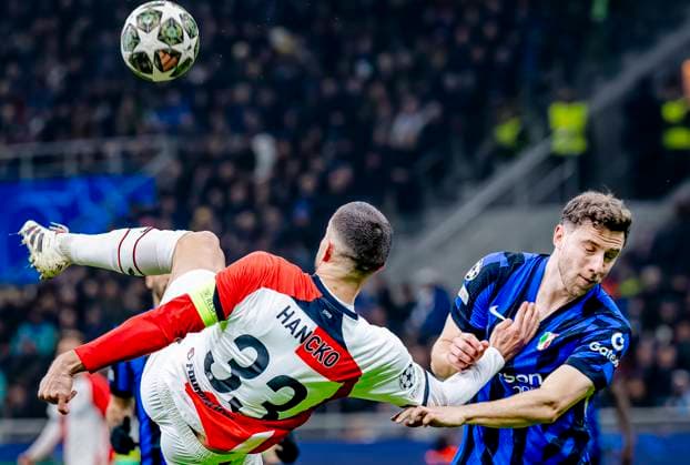 Feyenoord Rotterdam defender David Hancko, FC Internazionale Milan defender Carlos Augusto during the match Inter - Feyenoord at the San Siro Stadium for the UEFA Champions League - Round of 16 - 2st leg season 2024-2025 in MILAN, Italia on 11 march 2025, (photo by Marcel van Dorst EYE4images DeFodi Images)