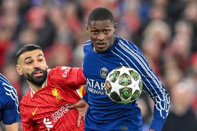 Liverpool v Paris Saint-Germain UEFA Champions League William Pacho of Paris Saint-Germain and Mohamed Salah of Liverpool battles for the ball during the UEFA Champions League Round of 16 Second Leg match at Anfield, Liverpool UK Newspapers OUT Copyright: xKarlxVallantinex FIL-21566-0040