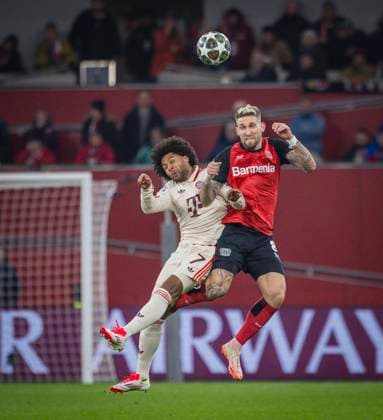 Leverkusen, Germany. 11th Mar 2025. Serge Gnabry (FCB) Robert Andrich (LEV) Bayer Leverkusen - FC Bayern München 11.03.2025