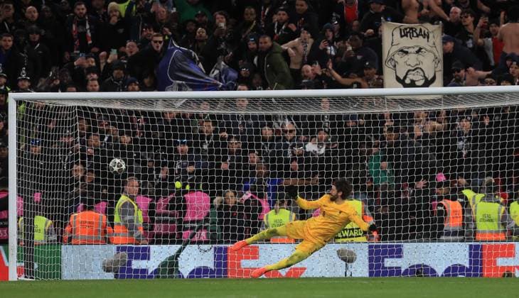 11th March 2025; Anfield, Liverpool, Merseyside, England; Champions League Last 16, Second Leg Football, Liverpool versus Paris Saint Germain; Liverpool goalkeeper Alisson Becker is sent the wrong way by Desire Doue of Paris Saint Germain during the penalty shoot out  ActionPlus12759067 DavidxBlunsden