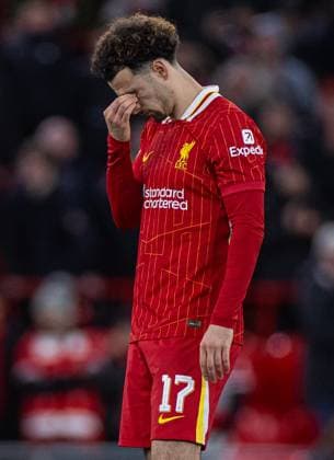 (250312) -- LIVERPOOL, March 12, 2025 -- Liverpool s Curtis Jones looks dejected after the UEFA Champions League Round of 16 2nd Leg match between Liverpool FC and Paris Saint-Germain FC in Liverpool, Britain, on March 11, 2025. (SP)BRITAIN-LIVERPOOL-FOOTBALL-UEFA CHAMPIONS LEAGUE-LIVERPOOL FC VS PSG LixYing 