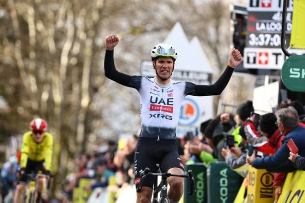 Portuguese Joao Almeida of UAE Team Emirates celebrates after winning stage four of the 83th edition of the Paris-Nice cycling race, 163,4km from Vichy to La Loge des Gardes, France, Wednesday 12 March 2025. DAVIDxPINTENS  x114779467x