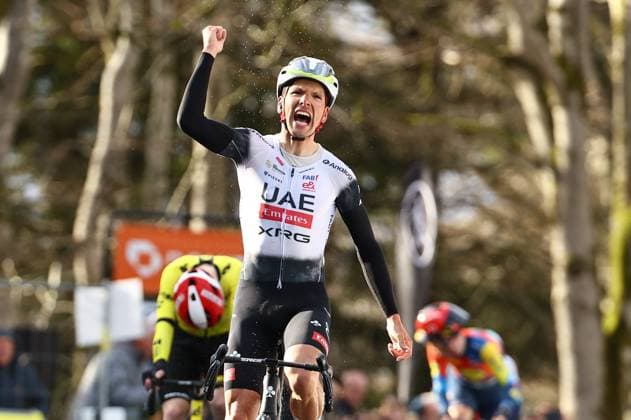 Portuguese Joao Almeida of UAE Team Emirates celebrates after winning stage four of the 83th edition of the Paris-Nice cycling race, 163,4km from Vichy to La Loge des Gardes, France, Wednesday 12 March 2025. DAVIDxPINTENS  x114780753x