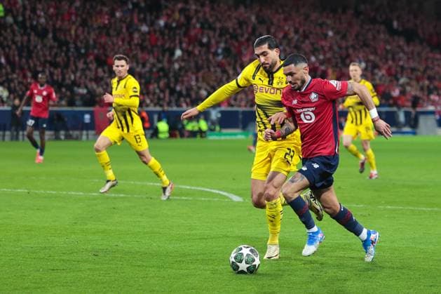12.03.2025, UEFA Champions League, Achtelfinale, Lille OSC - Borussia Dortmund, v. l. Emre Can (Borussia Dortmund), Remy Cabella (LOSC Lille), Lille Stade Pierre Mauroy Decathlon Arena Paris xRHR-FOTO DEx Copyright: DennisxEwert RHR-FOTOx RHR-FOTO DE
