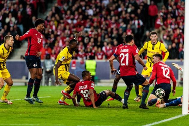 UEFA Champions League, LOSC Lille - Borussia Dortmund; 12.03.2025 Kampf im Strafraum Serhou Guirassy (Borussia Dortmund, 9), Bafode Diakite (LOSC Lille, 18), Benjamin Andre (LOSC Lille, 21), Thomas Meunier (LOSC Lille, 12), Lucas Chevalier (LOSC Lille, 30) UEFA Champions League Achtelfinale Rückspiel, LOSC Lille - Borussia Dortmund; Lille, Stade Pierre Mauroy am 12.03.2025 Copyright: xBEAUTIFULxSPORTS Wunderlx