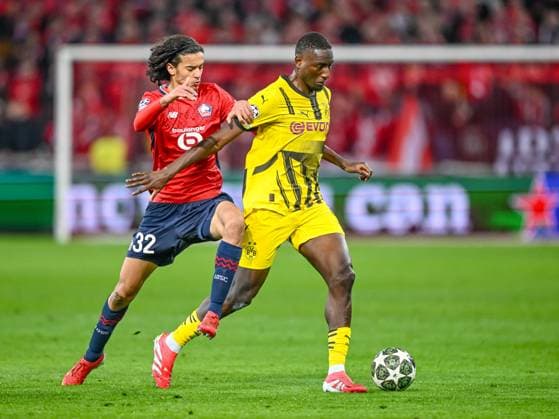 Lille, France, 12.03.2025: Ayyoub Bouaddi (LOSC Lille) und Serhou Guirassy (BV Borussia Dortmund) battle for the ball during the UEFA Champions League 2024 25 Round of 16 Second Leg match between LOSC Lille and Borussia Dortmund at Stade Pierre-Mauroy on March 12, 2025 in Lille, France. (Photo by Harry Langer DeFodi Images)