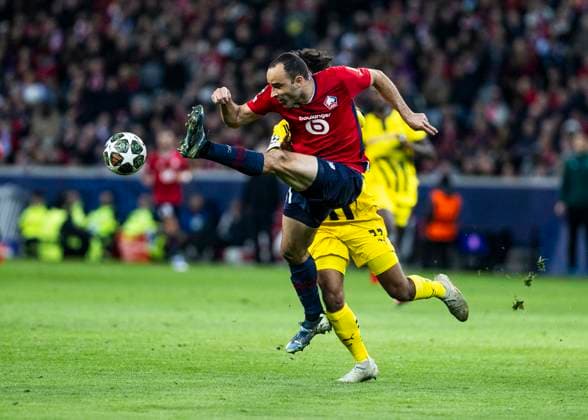 Lille, Stade Pierre Mauroy, 12.03.2025: Ismaily of Lille challenges Karim Adeyemi of Dortmund during the match of the Championsleague Round 16 between Lille OSC v. Borussia Dortmund.