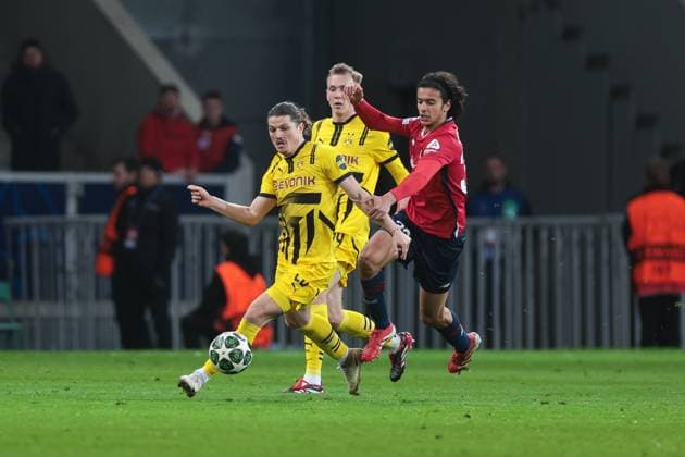 12.03.2025, UEFA Champions League, Achtelfinale, Lille OSC - Borussia Dortmund, v. l. Marcel Sabitzer (Borussia Dortmund), Ayyoub Bouaddi (LOSC Lille), Lille Stade Pierre Mauroy Decathlon Arena Paris xRHR-FOTO DEx Copyright: DennisxEwert RHR-FOTOx RHR-FOTO DE
