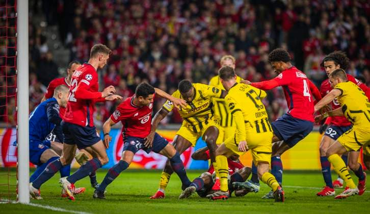 Lille, Germany. 12th Mar 2025. Serhou Guirassy (BvB) Benjamin Andre (Lille) Alexsandro Ribeiro (Lille) Pascal Gross (BvB) OSC Lille - Borussia Dortmund 12.03.2025
