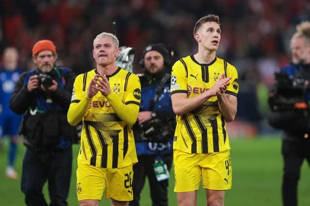 12.03.2025, UEFA Champions League, Achtelfinale, Lille OSC - Borussia Dortmund, v. l. Julian Ryerson (Borussia Dortmund), Nico Schlotterbeck (Borussia Dortmund) freuen sich, Lille Stade Pierre Mauroy Decathlon Arena Paris xRHR-FOTO DEx Copyright: DennisxEwert RHR-FOTOx RHR-FOTO DE