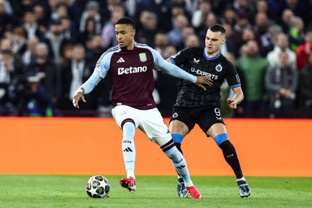 Aston Villa s Ezri Konsa and Club s Ferran Jutgla fight for the ball during a game between English club Aston Villa and Belgian soccer Club Brugge KV, Wednesday 12 March 2025 in Birmingham, United Kingdom, the second leg of the 1 8 finals of the UEFA Champions League knockout phase. BRUNOxFAHY  x114809060x