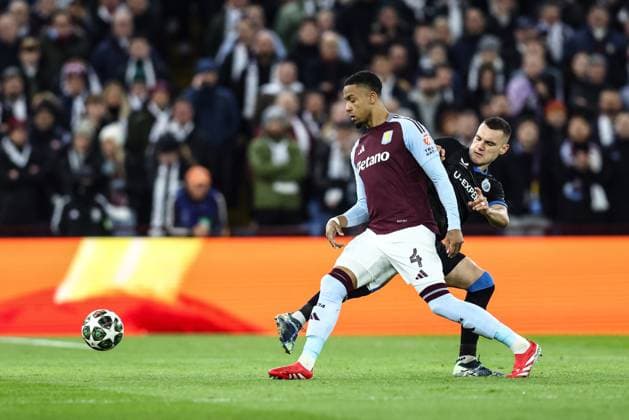 Aston Villa s Ezri Konsa and Club s Ferran Jutgla fight for the ball during a game between English club Aston Villa and Belgian soccer Club Brugge KV, Wednesday 12 March 2025 in Birmingham, United Kingdom, the second leg of the 1 8 finals of the UEFA Champions League knockout phase. BRUNOxFAHY  x114809102x