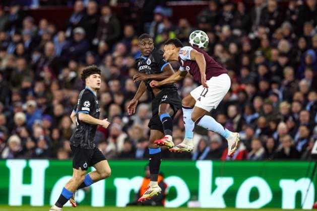 Club s Joel Ordonez and Aston Villa s Ollie Watkins fight for the ball during a game between English club Aston Villa and Belgian soccer Club Brugge KV, Wednesday 12 March 2025 in Birmingham, United Kingdom, the second leg of the 1 8 finals of the UEFA Champions League knockout phase. BRUNOxFAHY  x114809594x
