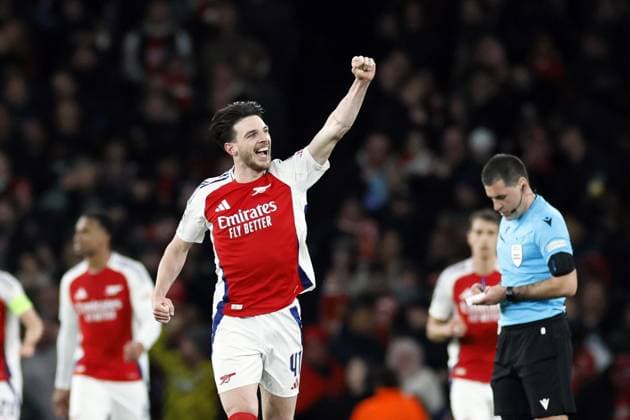 LONDON - Declan Rice of Arsenal FC celebrates the 2-1 during the UEFA Champions league match between Arsenal FC and PSV Eindhoven at Emirates Stadium on March 12, 2025 in London, England. ANP KOEN VAN WEEL UEFA Champions League 2024 25 Round of 16 Second Leg 2024 25 xVIxANPxSportx xxANPxIVx 522216741 originalFilename: 522216741.jpg