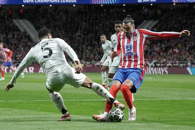 ATLETICO DE MADRID v REAL MADRID CF. CHAMPIONS LEAGUE 2024 2025. ROUND OF 16. 2ND LEG MATCH. Atletico de Madrid s Jose Maria Gimenez (r) and Real Madrid CF s Jude Bellingham during Champions League 2024 2025 Round of 16 2nd leg match. March 12,2025. (ALTERPHOTOS Acero) MadridSpain  Copyright: xAcerox