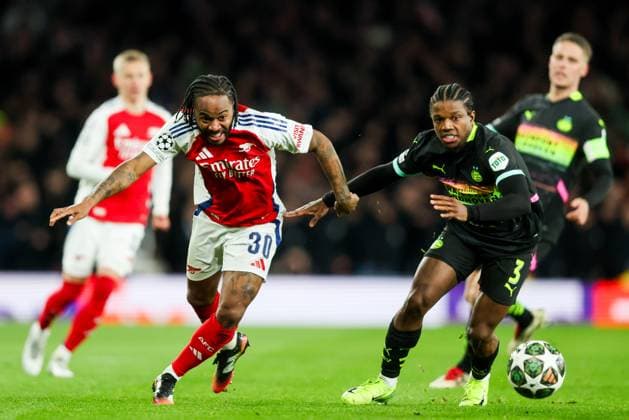 Raheem Sterling of Arsenal turns Tyrell Malacia of PSV Eindhoven Arsenal v PSV Eindhoven, UEFA Champions League, Round of 16, Second Leg, Football, Emirates Stadium, London, UK - 12 Mar 2025 EDITORIAL USE ONLY No use with unauthorised audio, video, data, fixture lists, club league logos or live services. Online in-match use limited to 120 images, no video emulation. No use in betting, games or single club league player publications. Copyright: xAndrewxFosker Shutterstockx 15188185bf