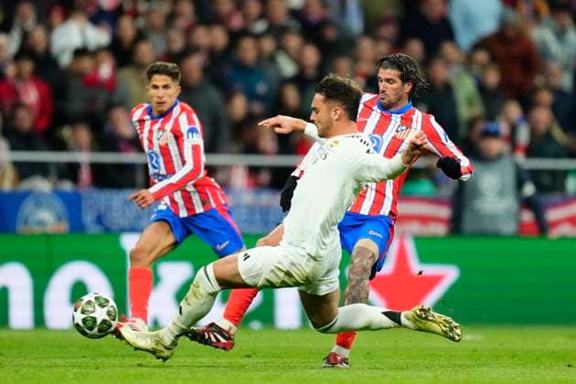 Atletico de Madrid v Real Madrid C.F. - UEFA Champions League 2024 25 Round of 16 Second Leg Rodrigo de Paul central midfield of Atletico de Madrid and Argentina and Raul Asencio centre-back of Real Madrid and Spain compete for the ball during the UEFA Champions League 2024 25 UEFA Champions League 2024 25 Round of 16 second leg match between Atletico de Madrid and Real Madrid C.F. at Estadio Riyadh Air Metropolitano on March 12, 2025 in Madrid, Spain. Madrid Spain  Copyright: xJosexBretonx originalFilename:bretonhernandez-atletico250312_npT72.jpg