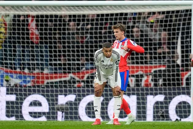 March 12, 2025, Madrid, Madrid, SPAIN: Kylian Mbappe of Real Madrid laments a penalty missed by Vinicius Junior during the UEFA Champions League 2024 25 League Round of 16 Second Leg match between Atletico de Madrid and Real Madrid CF, at Riyadh Air Metropolitano stadium on March 12, 2025, in Madrid, Spain. Madrid SPAIN - ZUMAa181 20250312_zaa_a181_151 Copyright: xOscarxJ.xBarrosox
