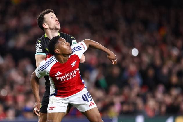 Arsenal v PSV Eindhoven 12 March 2025, London - UEFA Champions League - Round of 16 - Second Leg - Arsenal v PSV Eindhoven - Myles Lewis-Skelly of Arsenal and Ivan Perisic of PSV Eindhoven - Photo: Jacques Feeney Offside. London UK Copyright: xJacquesxFeeneyx xOffsidexOffside