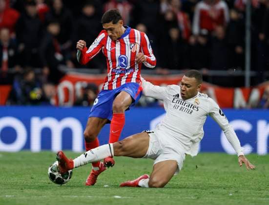 Atletico de Madrid v Real Madrid C.F. - UEFA Champions League 2024 25 Round of 16 Second Leg Kylian Mbappe of Real Madrid CF and Nahuel Molina of Atletico Madrid challenge during the UEFA Champions League 2024 25 UEFA Champions League 2024 25 Round of 16 second leg match between Atletico de Madrid and Real Madrid C.F. at Estadio Civitas Metropolitano on March 12, 2025 in Madrid, Spain. Madrid Estadio Metropolitano Spain Spain Copyright: xRichardxSellers Sportsphoto APLx 14061051
