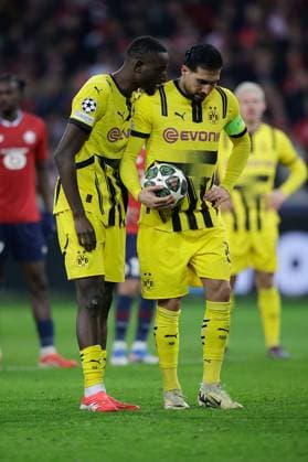March 12, 2025, Villeneuve-D ascq, France, Serhou Guirassy (Borussia Dortmund) and Emre Can (Borussia Dortmund) during the UEFA Champions League match between OSC Lille and Borussia Dortmund Copyright: AntonioxBorga