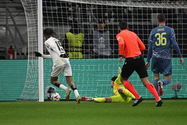 13.03.2025, xjhx, Fussball UEFA Europa League, Eintracht Frankfurt - Ajax Amsterdam v.l. Jean-Matteo Bahoya (Eintracht Frankfurt) Torschuetze, erzielt das Tor, Treffer, scores the goal 1:0 Matheus (Ajax Amsterdam) (DFL DFB REGULATIONS PROHIBIT ANY USE OF PHOTOGRAPHS as IMAGE SEQUENCES and or QUASI-VIDEO) Frankfurt am Main