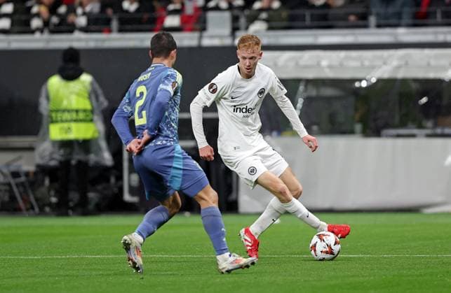 13.03.2025, xovx, Fußball UEFA Europa League, Eintracht Frankfurt - Ajax Amsterdam v.l. Lucas Rosa (Ajax Amsterdam), Hugo Larsson (Eintracht Frankfurt) (DFL DFB REGULATIONS PROHIBIT ANY USE OF PHOTOGRAPHS as IMAGE SEQUENCES and or QUASI-VIDEO) emspor Frankfurt am Main