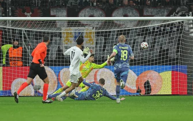 13.03.2025, xovx, Fußball UEFA Europa League, Eintracht Frankfurt - Ajax Amsterdam v.l. Hugo Ekitike (Eintracht Frankfurt) mit dem Tor zum 3:0, Matheus (Ajax Amsterdam), a35, Davy Klaassen (Ajax Amsterdam) (DFL DFB REGULATIONS PROHIBIT ANY USE OF PHOTOGRAPHS as IMAGE SEQUENCES and or QUASI-VIDEO) emspor Frankfurt am Main