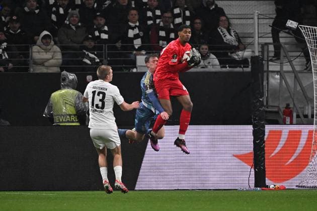 13.03.2025, xjhx, Fussball UEFA Europa League, Eintracht Frankfurt - Ajax Amsterdam v.l. Rasmus Kristensen (Eintracht Frankfurt) Kaua Santos (Eintracht Frankfurt) Oliver Edvardsen (Ajax Amsterdam) (UEFA REGULATIONS PROHIBIT ANY USE OF PHOTOGRAPHS as IMAGE SEQUENCES and or QUASI-VIDEO) Frankfurt am Main