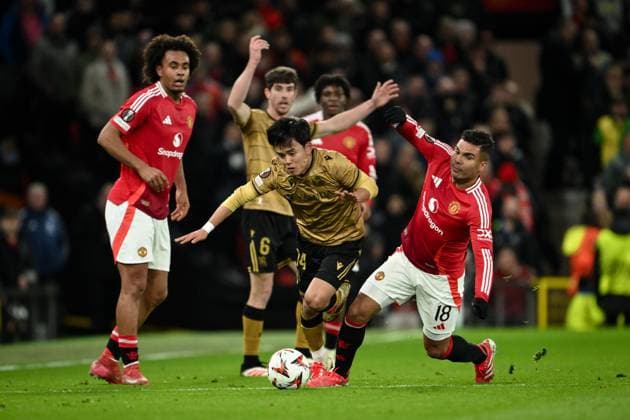 UEFA Europa League Last 16 Manchester United, ManU v Real Sociedad Takefusa Kubo of Real Sociedad evades a challenge from Casemiro of Manchester United during the UEFA Europa League Last 16 match Manchester United vs Real Sociedad at Old Trafford, Manchester, United Kingdom, 13th March 2025 (Photo by Craig Thomas News Images) Manchester Old Trafford Greater Manchester United Kingdom Copyright: xCraigxThomas NewsxImagesx