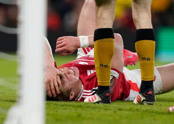 Manchester, England, 13th March 2025. Rasmus Hojlund of Manchester United, ManU holds his head during the UEFA Europa League match Manchester United v Real Sociedad at Old Trafford, Manchester. Picture credit should read: Andrew Yates Sportimage EDITORIAL USE ONLY. No use with unauthorised audio, video, data, fixture lists, club league logos or live services. Online in-match use limited to 120 images, no video emulation. No use in betting, games or single club league player publications. SPI_039_AY_MANU_SOCIEDAD SPI-3744-0039