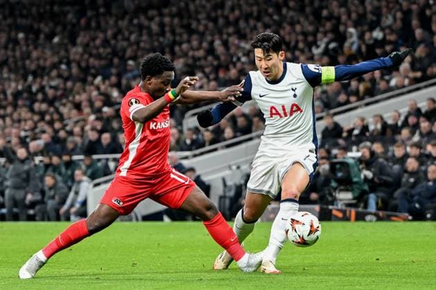 Tottenham Hotspur v AZ Alkmaar Europa League 13 03 2025. Tottenham Hotspur forward Son Heung-Min (7) takes on AZ Alkmaar forward Ernest Poku (21) during the Europa League match between Tottenham Hotspur and AZ Alkmaar at Tottenham Hotspur Stadium, London, United Kingdom on 13 March 2025. London Tottenham Hotspur Stadium London United Kingdom Editorial use only , Copyright: xSimonxTraylenx PSI-21627-0036