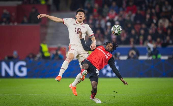 Leverkusen, Germany. 11th Mar 2025. Min-jae Kim (FCB) Jeremie Frimpong (LEV) Bayer Leverkusen - FC Bayern München 11.03.2025
