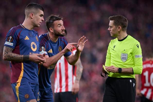 ATHLETIC DE BILBAO v AS ROMA. UEFA EUROPA LEAGUE 2024 2025. ROUND OF 16. Referee Clement Turpin (r) AS Roma™s Bryan Cristante (c) and Gianluca Mancini (l) during UEFA Europa League 2024 2025 Round of 16 2nd leg match. March 13,2025. (ALTERPHOTOS Jorge Ropero) BilbaoSpain  Copyright: xJorgexRoperox