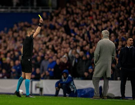 13th March 2025; Ibrox Stadium, Glasgow, Scotland; UEFA Europa League Last 16 Second Leg Football, Rangers versus Fenerbahce; Rangers Caretaker Manager Barry Ferguson is yellow carded by referee Espen Eskas  ActionPlus12759926 VagelisxGeorgariou