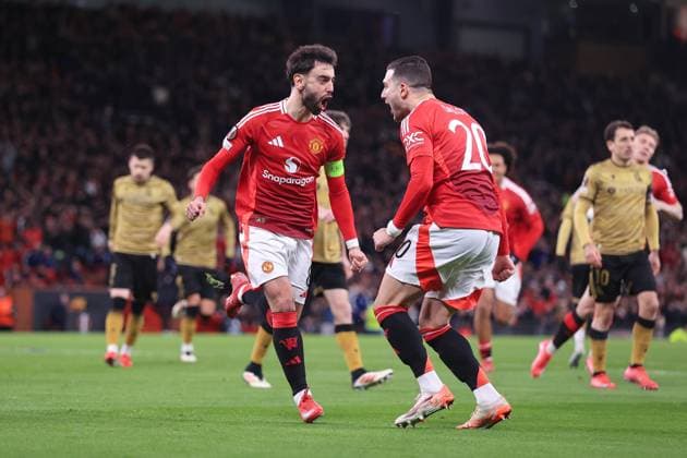 Football - UEFA Champions League - Round of 16 (2nd Leg) - Manchester United, ManU v Real Sociedad 13th March 2025 - UEFA Europa League - Round of 16 (2nd Leg) - Manchester United v Real Sociedad - Bruno Fernandes of Manchester United (L) celebrates weith Diogo Dalot of Manchester United after scoring their 2nd goal - Photo: Simon Stacpoole Offside. Manchester UK Copyright: xSimonxStacpoolexOffside