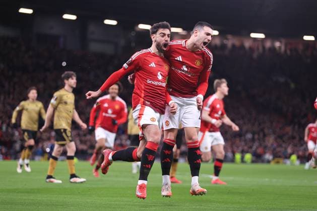 Football - UEFA Champions League - Round of 16 (2nd Leg) - Manchester United, ManU v Real Sociedad 13th March 2025 - UEFA Europa League - Round of 16 (2nd Leg) - Manchester United v Real Sociedad - Bruno Fernandes of Manchester United (L) celebrates weith Diogo Dalot of Manchester United after scoring their 2nd goal - Photo: Simon Stacpoole Offside. Manchester UK Copyright: xSimonxStacpoolexOffside